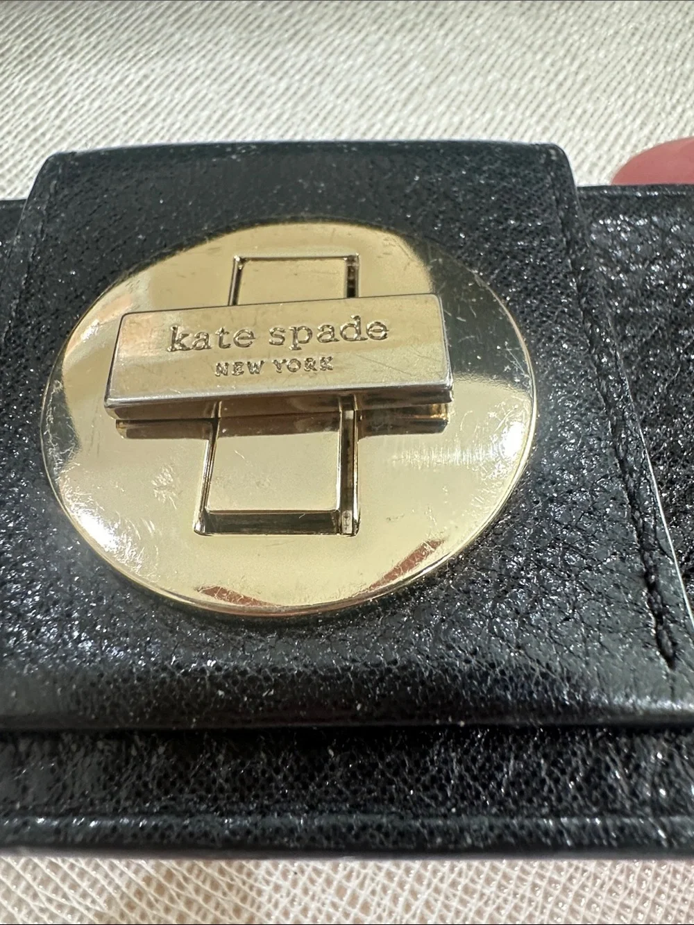 kate spade Black Leather Card & Key Holder with Gold Turnlock Medallion